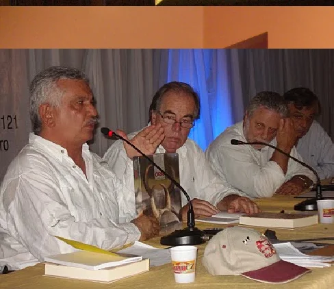 ALBERTO FROLA EXPONIENDO CON MANUEL CIPRIANO HEREDIA. FEDENAGA